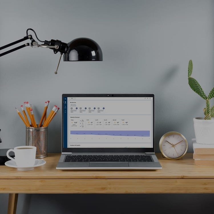 desk-with-laptop-showing-ion-smarthome-mb
